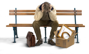 Sad man siting on a bench